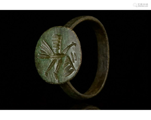 MEDIEVAL BRONZE RING WITH A MYTHOLOGICAL BIRD