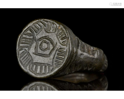 MEDIEVAL BRONZE RING WITH HEXAGRAM AND SUN PATTERN