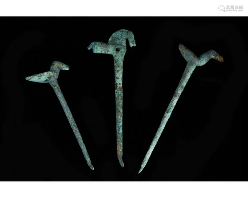 THREE ROMAN BRONZE PINS WITH ANIMALS