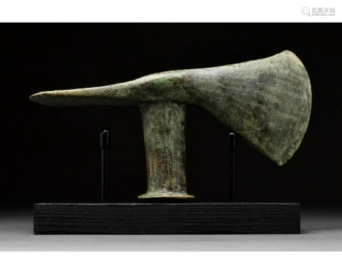 BRONZE AGE BATTLE AXE HEAD ON STAND