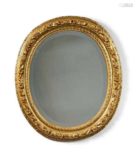 MIRROR IN AN OVAL FRAME