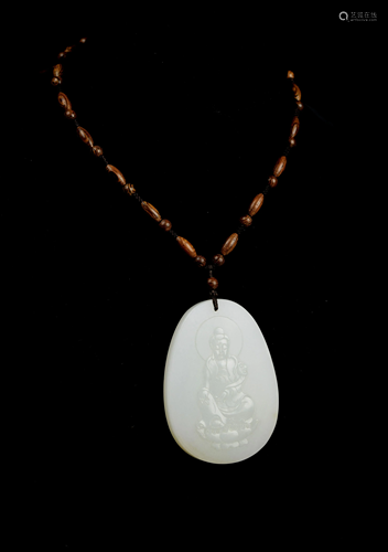 [Chinese] A Hetian White Jade Carved Gautama Buddha