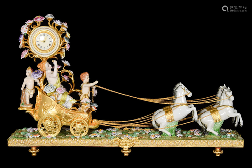 A Continental Porcelain Flora Carriage Mantel Clock