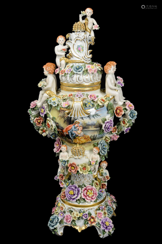 A Continental Porcelain Lidded Floral Trophy with