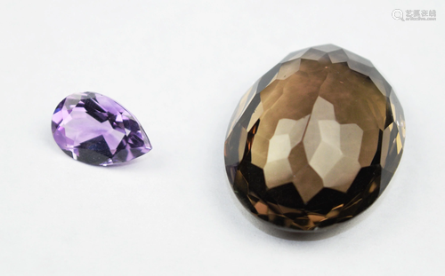 An Oval Cut Smoky Quartz and a Pear Cut Amethyst