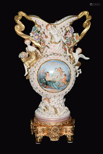 A Large Continental Trophy Shape Vase Covered with