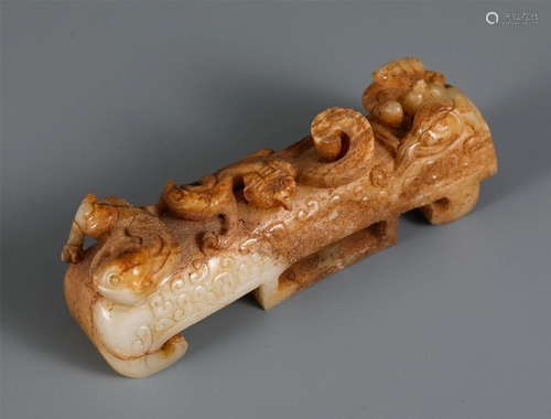 A CHINESE ARCHAIC JADE CARVED BEAST DECORATION