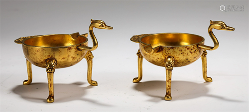 TWO CHINESE ANIMAL SHAPED GILT BRONZE CUPS