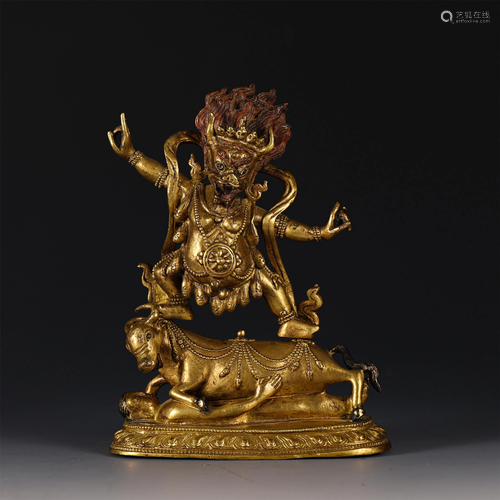 A CHINESE GILT BRONZE FIGURE OF BUDDHA