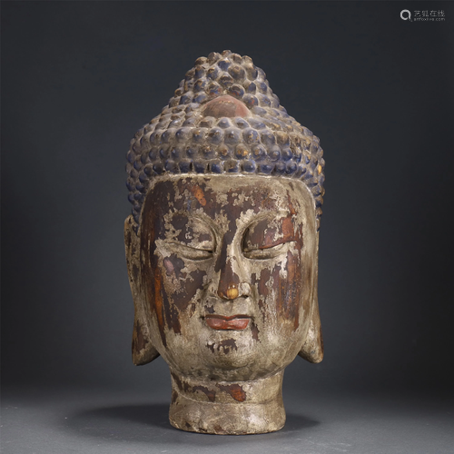 A CHINESE WOODEN BUDDHA HEAD