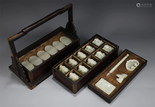 A SET OF CHINESE JADE CARVINGS AND STORAGE BOX