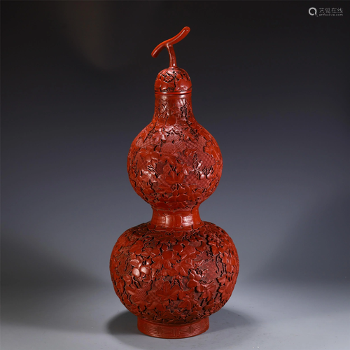 A CHINESE CARVED LACQUER DOUBLE-GOURDS VASE AND COVER