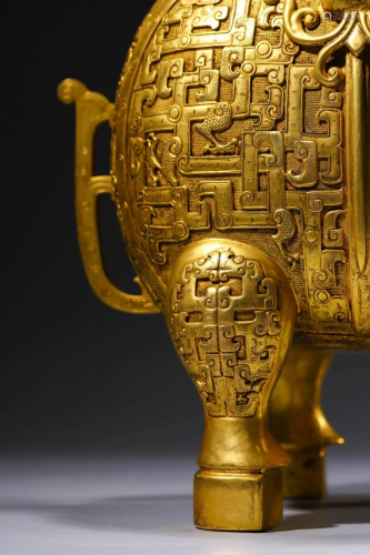 Chinese. A Gilt-Bronze Rhino Vase