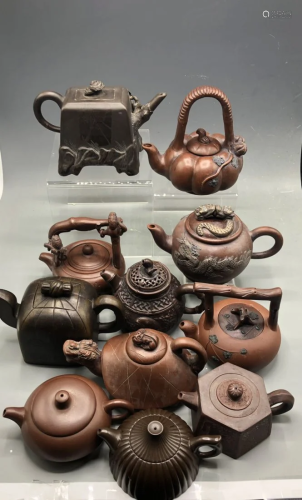 Group of 11 Yixing Teapots