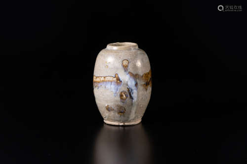 古代白釉窑变罐