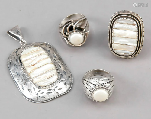 Four pieces of silver jewelry,