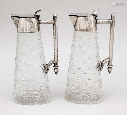 Pair of silver mounted jugs, G