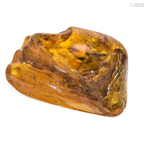 Amber chunk, partially ground,