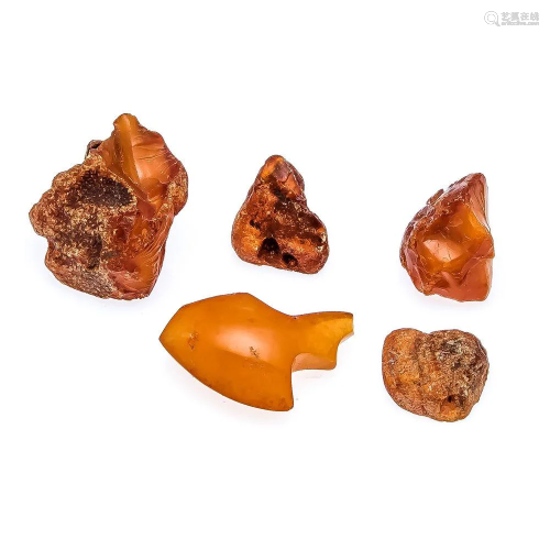 5 amber chunks, partially cut,