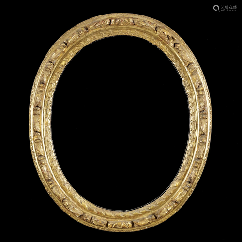 An oval carved gilt wood frame, 19th century