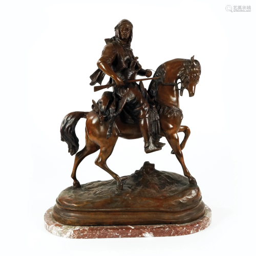 A patinated bronze figure of a Berber hunter on