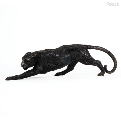 A patinated bronze figure of a leopard