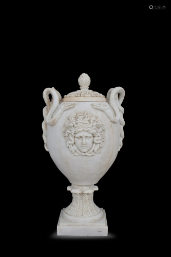 A pair of French white marble graven vases