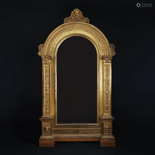 A carved and gilt wood arch vitrine, first half of 19th