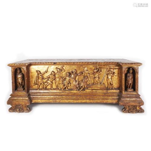 A carved gilt wood cassone
