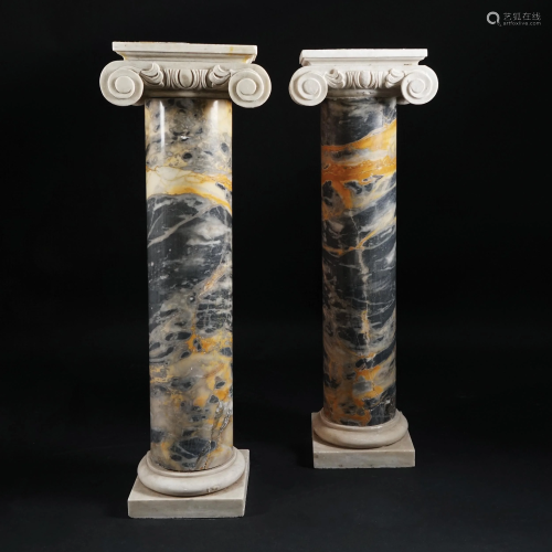 A pair of polychrome and white marble columns