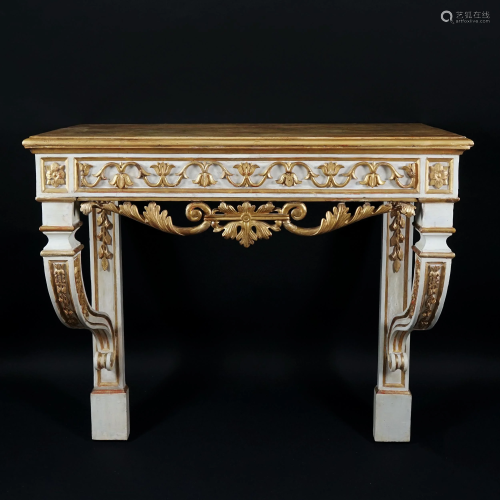A pair of lacquered and gilt carved wood consoles and