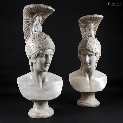 A pair of white marble busts of a warrior with a