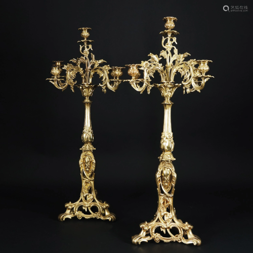 A pair of gilt bronze five-lighr candelabra