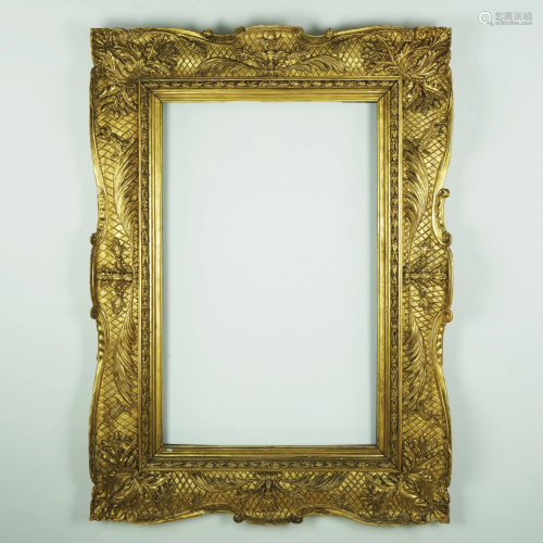A carved gilt wood frame, early 19th century