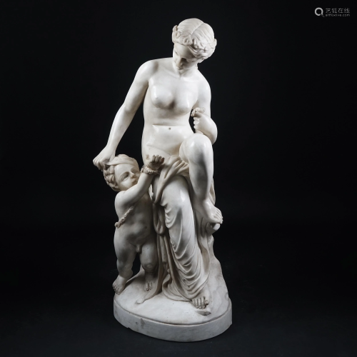 A white marble sculpture of Venus and Cupid
