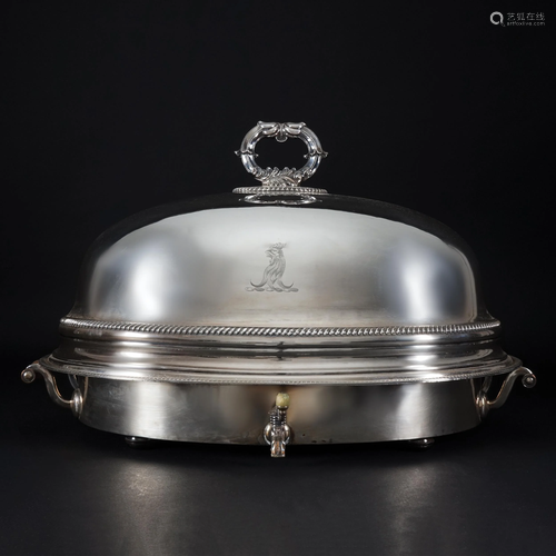 A silver metal boiled food warmer