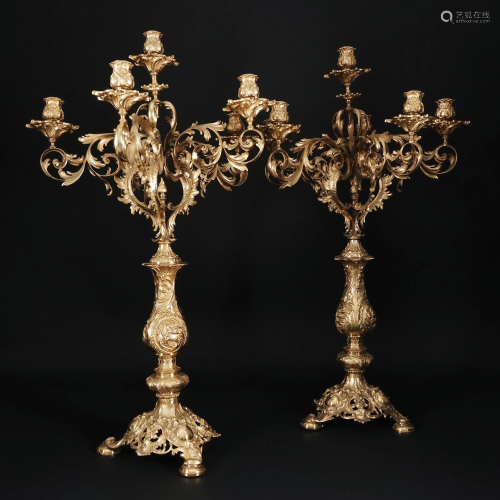 A pair of gilt bronze sixt-light candelabra
