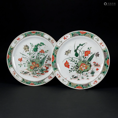 A pair of Chinese white and polychrome porcelain plates