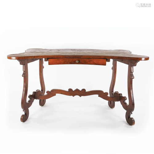 An antique walnut table