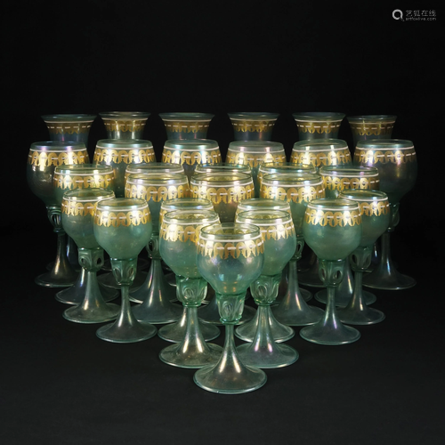 A Murano iridescent green glass service