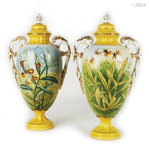 A pair of French polychrome porcelain potiches and