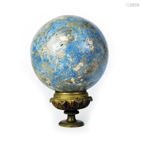 A lapis-lazuli sphere on a gilt bronze socle