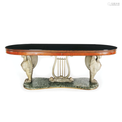 An ash tree venereed black glass oval top table