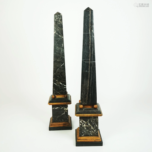 A pair of black Marquina marble and giallo antico