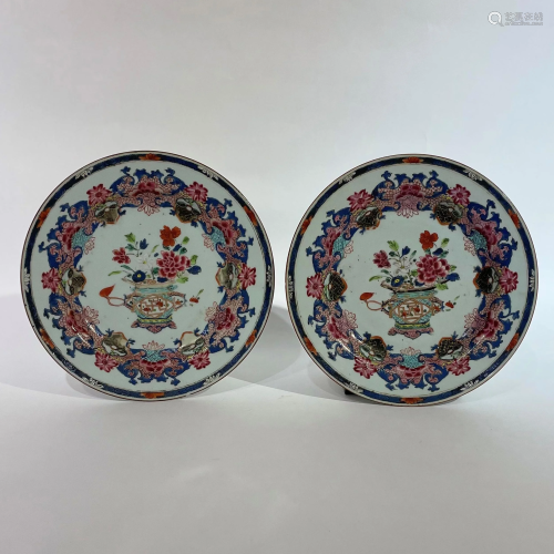 A pair of Chinese white and polychrome porcelain plates