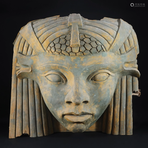 A large fiberglass head of a sphinx, '60s