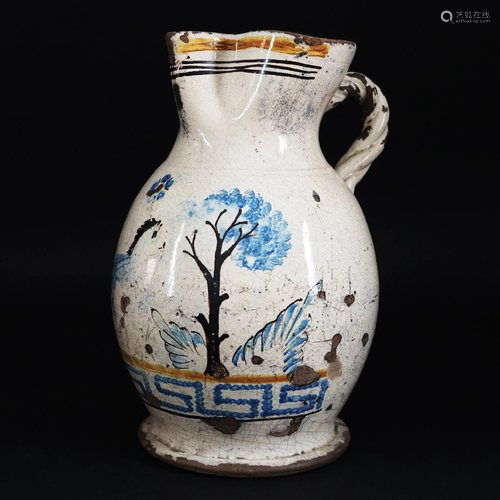 A white and polychrome maiolica large carafe