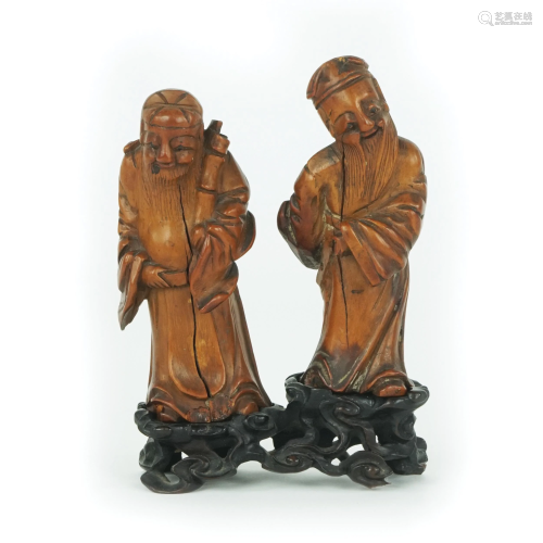 2 Chinese wood sculptures of a wiseman, 19th century