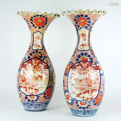 A pair of Chinese white, red and blue porcelain vases