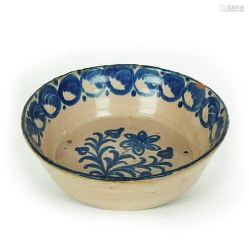 An antique white and blue maiolica bowl